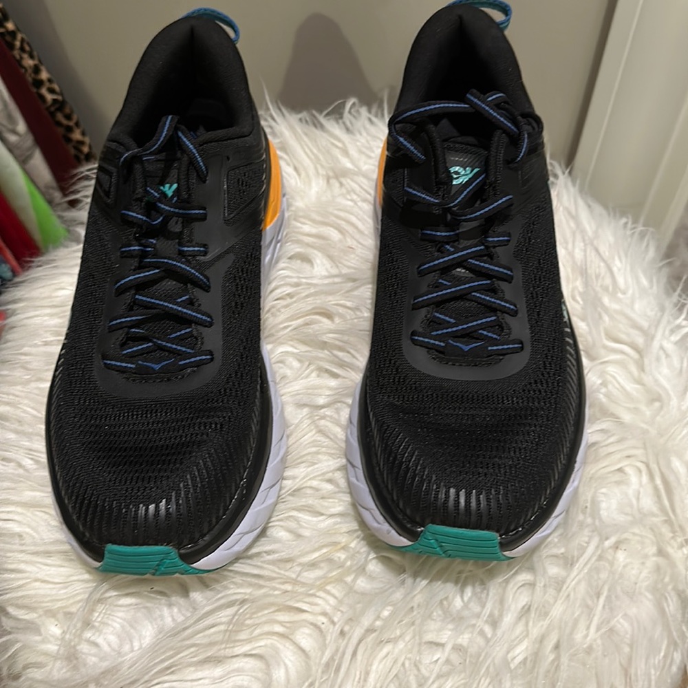 Hoka One Sneakers Bondi 7 Black with teal and orange stripe worn once. 7.5 size